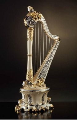 luksusowy gadżet instrument harfy z ceramiki (obrazek zapożyczony ze strony https://www.luxuryproducts.pl/eleganckie-wnetrze-apartamentu-harfa-z-ceramiki.html)