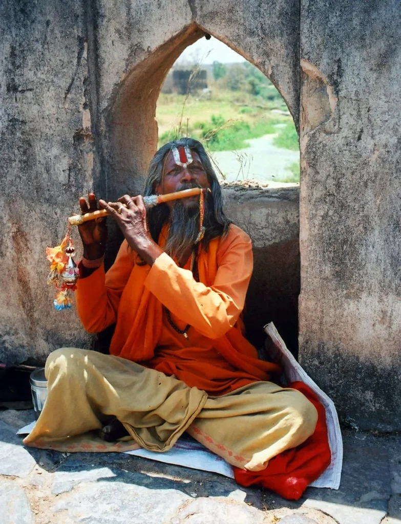 man using flute